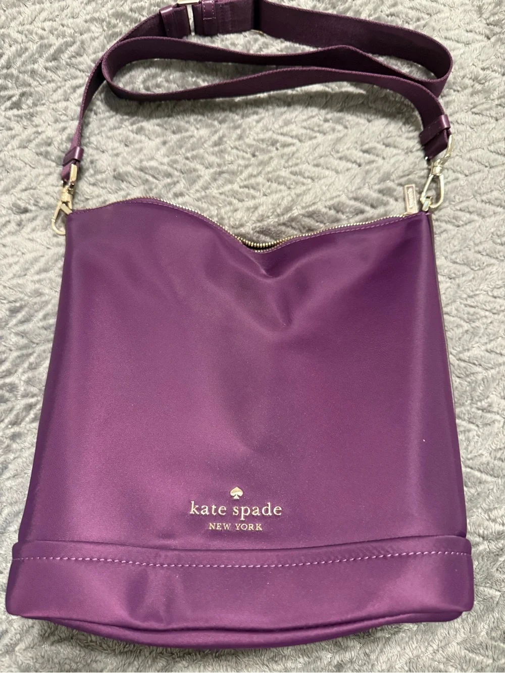 kate spade purple leather crossbody bag with gold logo